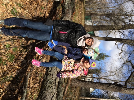 Family out for a walk in the woods near our house
